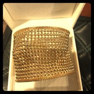 Gold Flexible cuff with beaded design